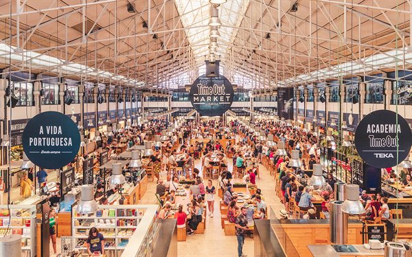 Diners at the Time Out Market food hall in Lisbon