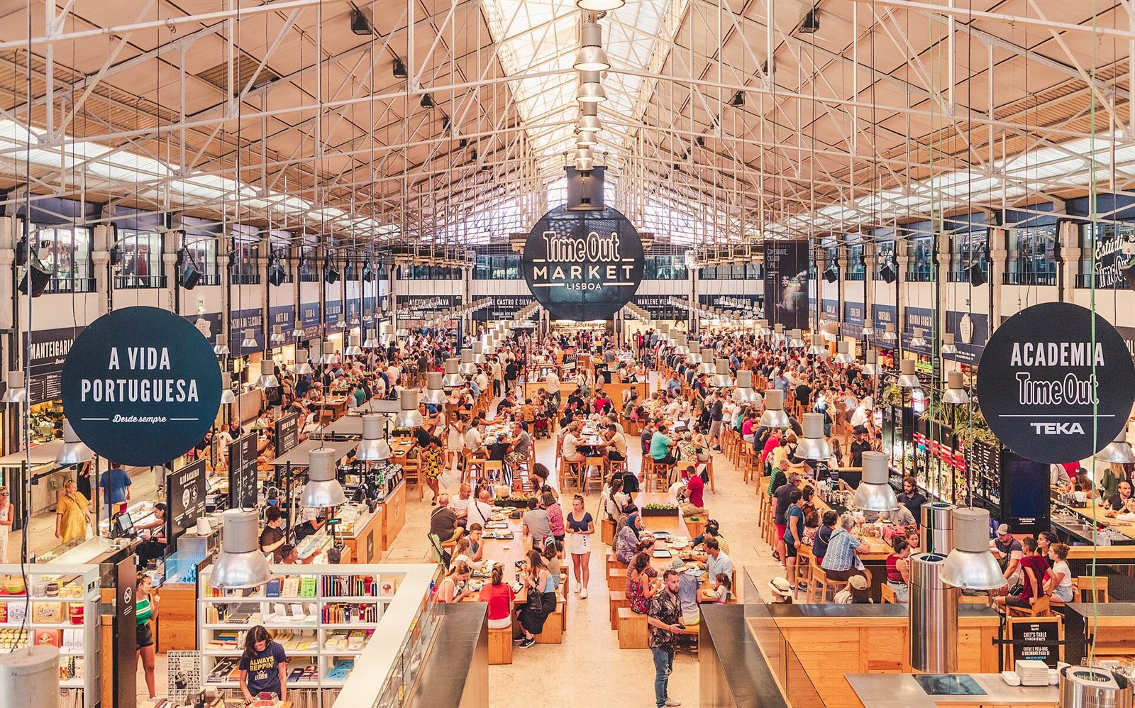 Diners at the Time Out Market food hall in Lisbon